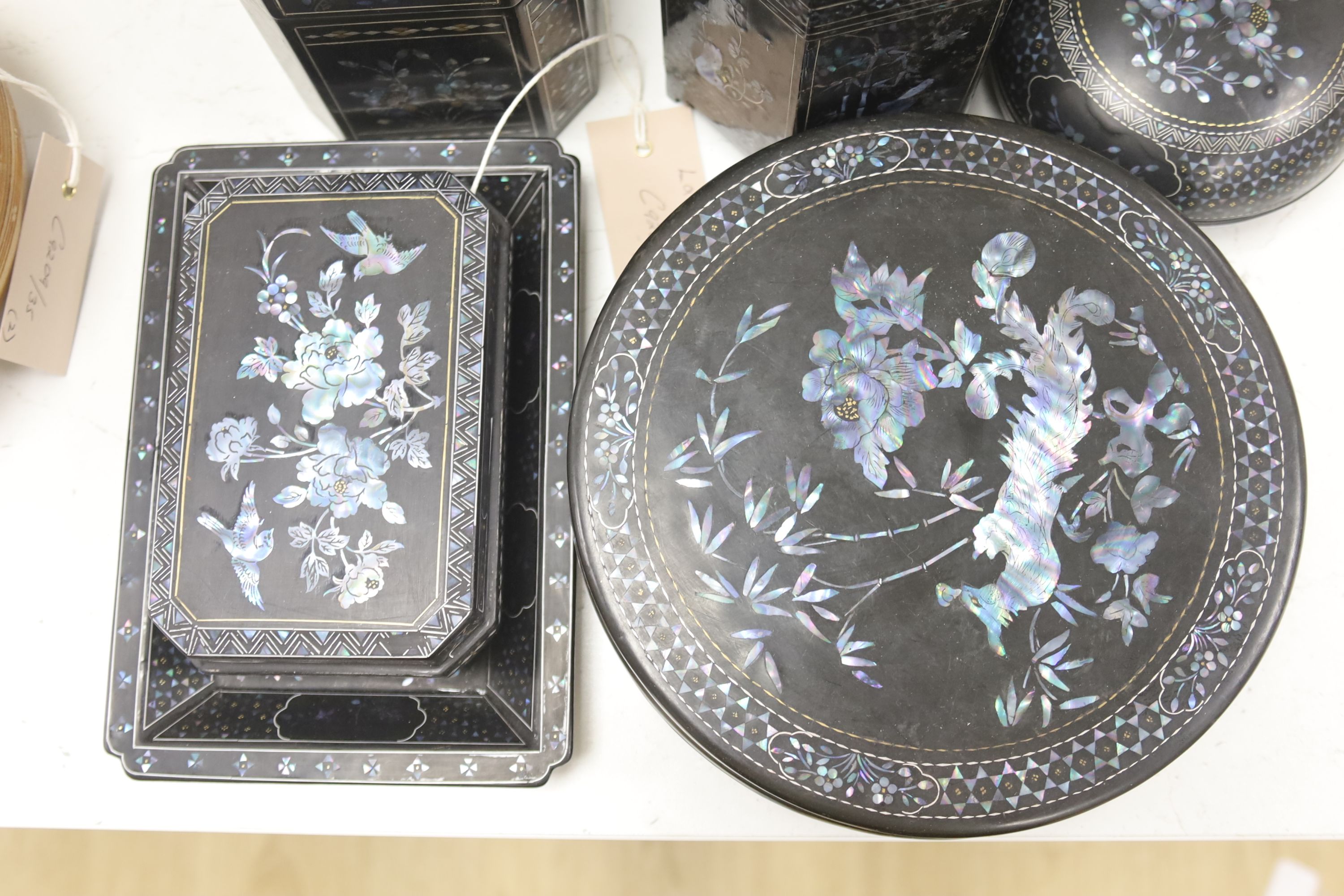 A collection of Lac Burgaute boxes and dishes, largest of circular form 20cm diameter (17)